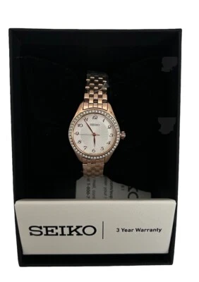 Reloj para mujer Seiko Essentials oro rosa cristal acero inoxidable esfera blanca SUR396 Foto 1 de 4