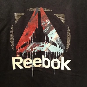 Camisa Reebok Letras Levantadas Logotipo de Goteo Niños Clásica Marina Pequeña (6-7) - Imagen 1 de 9