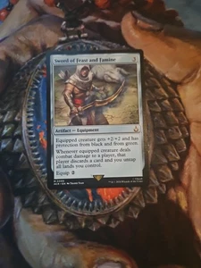 Sword of Feast and Famine Universes Beyond: Assassin's Creed Regular - Picture 1 of 1