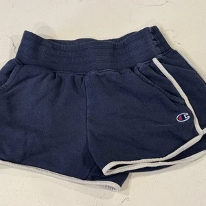 Pantalones Cortos Champion Azul Marino Tejido Inverso Terry Para Mujer Pequeños Ajuste Retro Logo Borde - Imagen 1 de 5