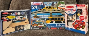 Lot 3 Melissa & Doug Decorate Jet Plane, Race Car Bank, 24 PC Floor Puzzle Cars - Picture 1 of 10