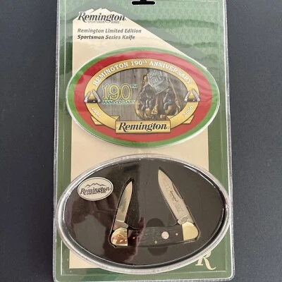 Cuchillo canoa Remington negro ciervo Delrin 190 aniversario con lata 2006 sellado Foto 1 de 4