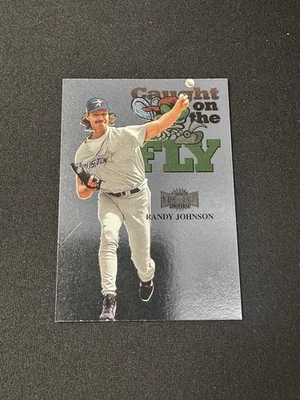 1999 Skybox Metal Universe Randy Johnson Caught On The Fly #234 - Image 1 of 2