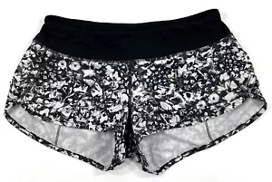 Lululemon Damen Speed Up Shorts Größe 6 gefüttert Laufen Fitnessstudio sportlich schwarz Blumenmuster - Bild 1 von 12