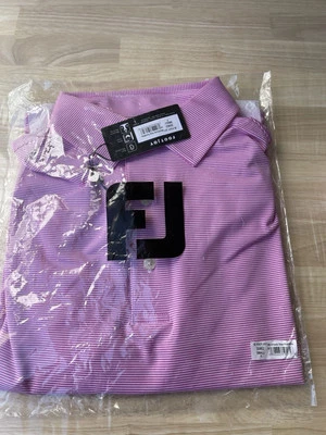 Camisa de Golf FootJoy Polo Micro Alimentador Rayas Mediana Rosa Blanco Poliéster Precio de venta sugerido por el fabricante 78 USD Foto 1 de 4