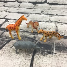 African Wildlife Animal Figures Lot Of 4 Lion Rhino Leopard Giraffe 2-3” Toys