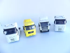 NEW RAY 1:43 / CAMIONS 4 TRACTEURS ROUTIERS SCANIA X 1 / MERCEDES X 2 / MAN X1 - Foto 1 di 3