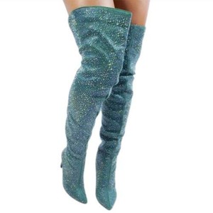 rhinestone encrusted thigh high boots