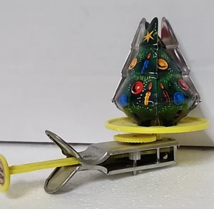 Vintage 1950's Tin Litho Spinning Christmas Tree Push Toy Santa Clause Works - Picture 1 of 8