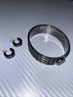 Pulsera y pendientes Coach de metal negro Foto 1 de 4