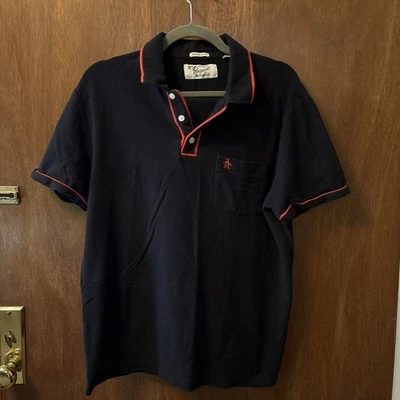 Original Penguin Polo Para Hombres Grande Heritage Calce Ajustado Polo Negro Naranja Foto 1 de 4