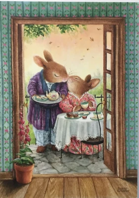 Amanecer - Susan Wheeler - Aniversario - Cónyuge - Conejitos besándose durante el desayuno Foto 1 de 4