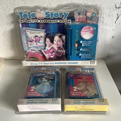 Sistema interativo de livros de histórias Tele Story com Dora, Cinderela e Rei Leão NOVO - Imagem 1 de 4