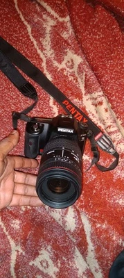 Câmera SLR Pentax K100D Super Digital sigma 70-300mm kit lente sem bateria - Imagem 1 de 4