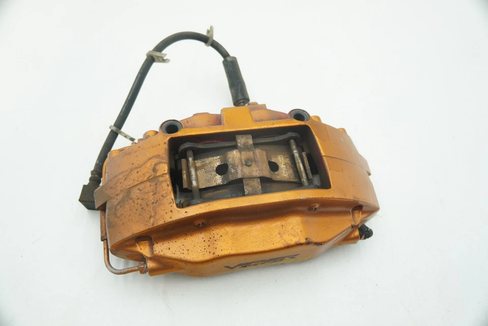 Pinza de freno delantera derecha pintada naranja 5136152AA OEM Dodge Viper SRT10 2003-17 Foto 1 de 4