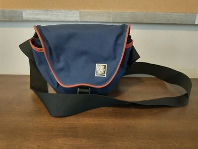Bolsa tiracolo Crumpler Home Stayer para câmera azul com acabamento laranja - RJ - Imagem 1 de 4