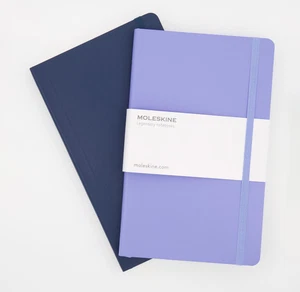 2x Moleskine  Large A5 (21cm x 13cm) Ruled Soft Cover Notebooks - Blue /Lilac - Picture 1 of 3