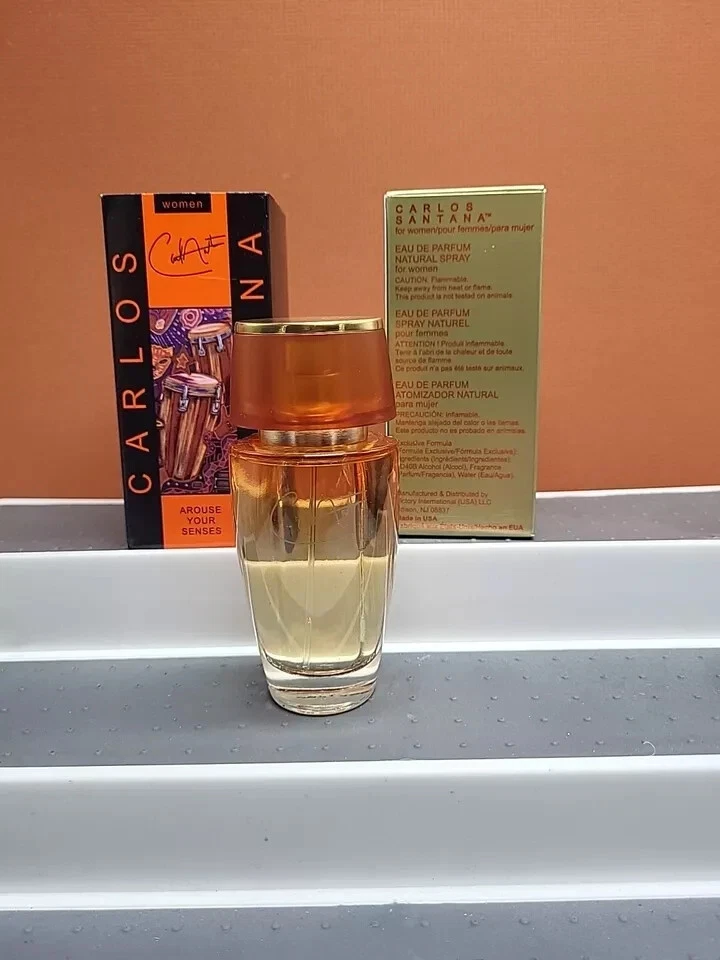 CARLOS SANTANA 1,7 OZ/50 ML EDP SPRAY MUJER NUEVO EN CAJA DESCONTINUADO (Y 1 perfume gratis) Foto 1 de 1