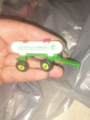 ERTL John Deere 1/64 Anhydrous Ammonia Tractor Tank Trailer w/Yellow Rims, 3" - Image 1 of 3