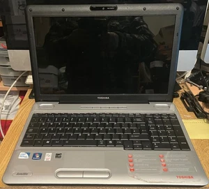Toshiba Satellite L500 19X Laptop and Charger.  No Hard Drive - Picture 1 of 10