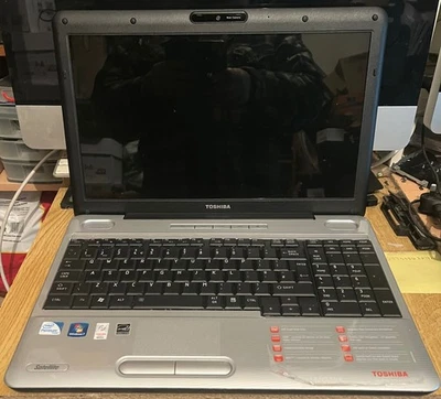 Toshiba Satellite L500 19X Laptop and Charger.  No Hard Drive - Image 1 of 4