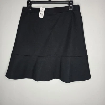 Falda Loft para mujer negra talla mediana borde peplum elástica por encima de la rodilla Foto 1 de 4