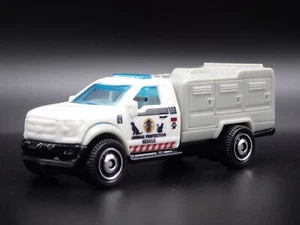 2009-2014 Ford Pick-Up Camion Animale Controllo Bianco 1/64 MB Modello Auto - Foto 1 di 7
