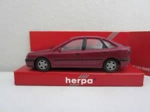 HERPA 031622 RENAULT LAGUNA SEDAN in RED - model is PLASTIC - HO or 1:87 scale - Picture 1 of 1