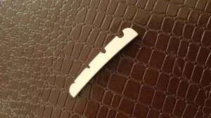 NEW NUT Jazz basse pré-fendu - mélamine - 38mm - fond incurvé - guitare JBass - Picture 1 of 1