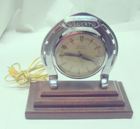 Vintage United Lucky Horseshoe Electric Clock Works Great Chrome & Wood Cover