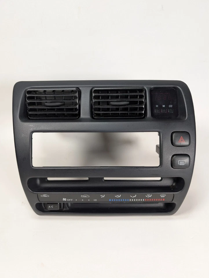 93-97 Toyota Corolla OEM AC Heater Climate Control Dash Bezel Trim, Vent & Clock - Image 1 of 4