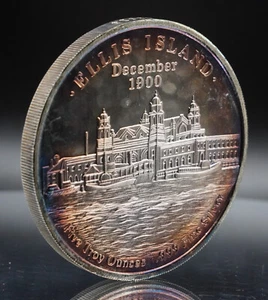 1986 Ellis Island Statue of Liberty TONED 5oz 999 FINE Silver round C4945 - Picture 1 of 10