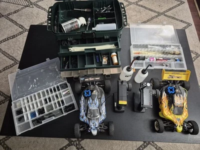 EXCEED RC NITRO LOT 2 CARS REMOTES AND TON OF PARTS - Image 1 of 4