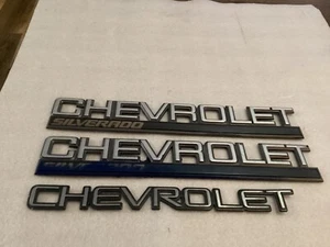 3 CHEVROLET PLASTIC EMBLEMS AS IS FOR PARTS - Picture 1 of 14