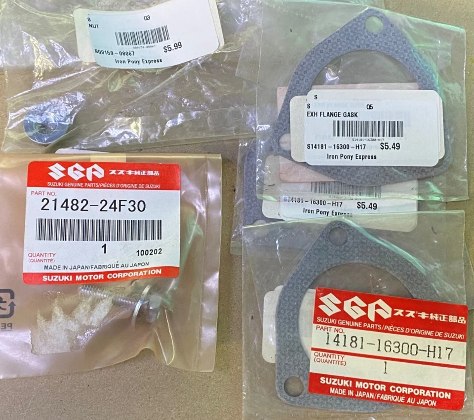 Junta de brida de escape Suzuki OEM x3 y accesorios diversos RM250 RM-250 14181-16300-H17 Foto 1 de 1