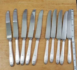 10 COLTELLI DA TAVOLA VINTAGE 1923 GROSVENOR NUOVI FRANCESI PLACCATI ARGENTO 5 "9 1/2" 5 "9 3/4" - Foto 1 di 8
