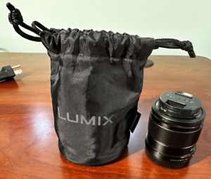 Panasonic Lumix G 42.5mm f/1.7 Aspherical Power O.I.S. Lens  Black w/ carry case