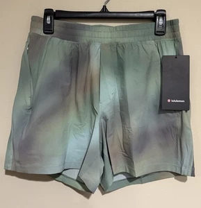 Neu mit Etikett lululemon Medium Pace Breaker Herrenshorts 5" * gefütterte Shorts CDGM grün - Bild 1 von 3