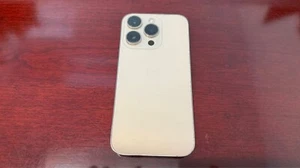 Apple iPhone 14 Pro - 256GB - Gold (Ohne Simlock) - Kosmetische Probleme - Bild 1 von 9