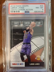 2019-20 Panini NBA Hoops Lights Camera Action Winter LeBron James #20 LCA PSA 8