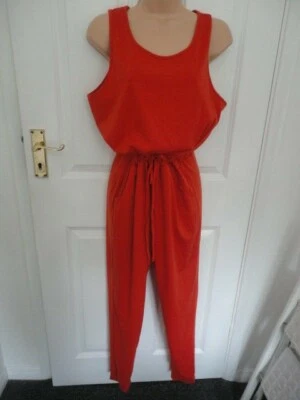 Sleeveless one piece jumpsuit. Size M (approx UK 10/12).Burnt Orange - Image 1 of 4