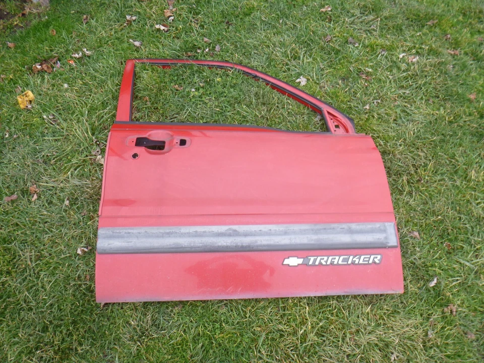 Chevrolet Tracker 2002 puerta delantera lado del pasajero delantero derecho rojo Foto 1 de 4