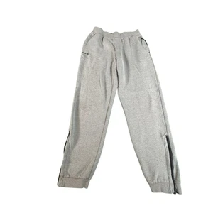 Pantalones deportivos Artengo Oxylane grises M cremallera dobladillo bolsillos tenis - Imagen 1 de 12
