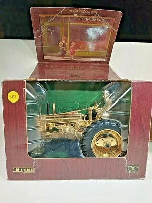 JOHN DEERE Model A with Man GOLD 1/16 15569A 2003 in Box ERTL - Image 1 of 2