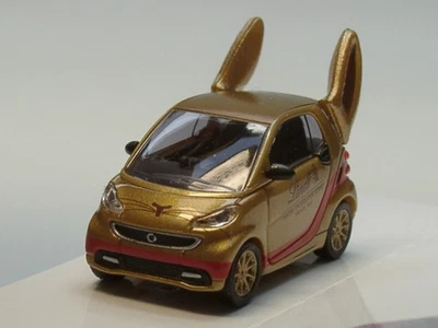 Busch Smart Fortwo Coupe, LINDT Goldhase - 46211 - 1:87 - Bild 1 von 4
