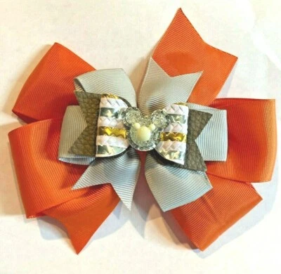 Hermoso lazo de pelo inspirado en Mickey Mouse de cristal dorado y plateado para niñas.  Foto 1 de 2