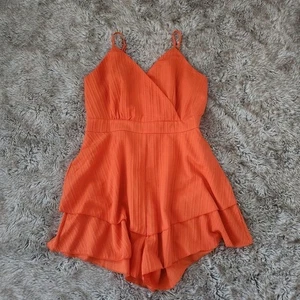 Niay Strampler orange strukturiert Rüschenbesatz Größe Large - Bild 1 von 11