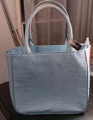 Bolso/cartera de mano Express de cuero genuino azul pálido  Foto 1 de 4