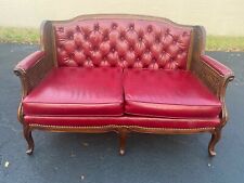 CHESTERFIELD STYLE VINTAGE CHIPPENDALE TUFTED LOVESEAT W/ NAILHEAD & CANING SIDE