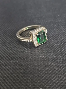 Gold Plated Ring Featuring Emerald Cut Green Stone Surround Small Clear Stones - Picture 1 of 8